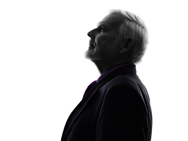 senior business man silhouette One Caucasian Senior Business Man Silhouette White Background man shadow head stock pictures, royalty-free photos & images