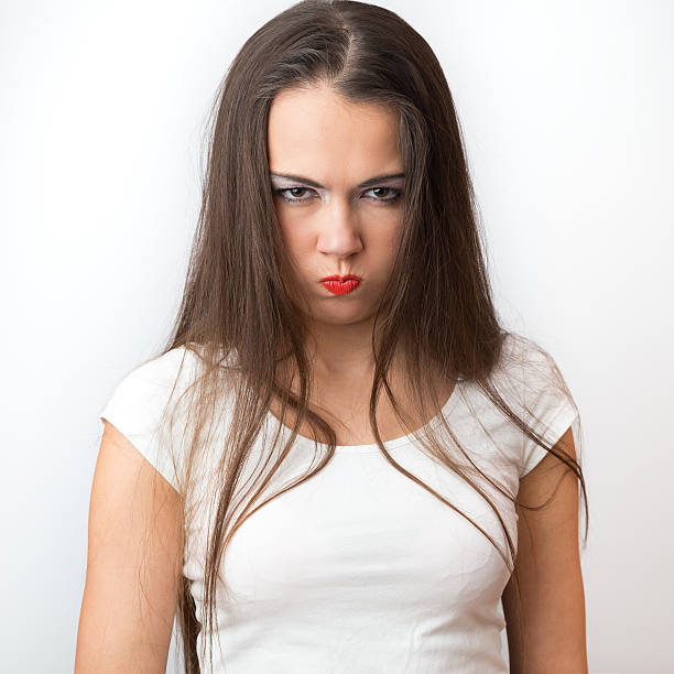 istock Portrait of offense brunette on white background 531610267