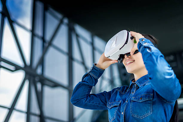 istock Woman wearing virtual reality glasses 531612090