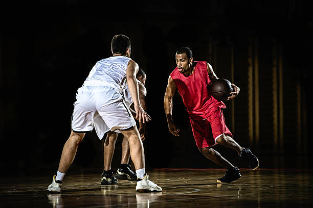 istock Young Men Playing Basketball 531612963