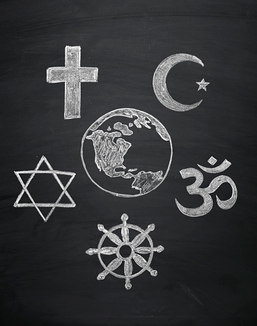 blackboard concept, signs of world religions - major religions group chalked on a blackboard