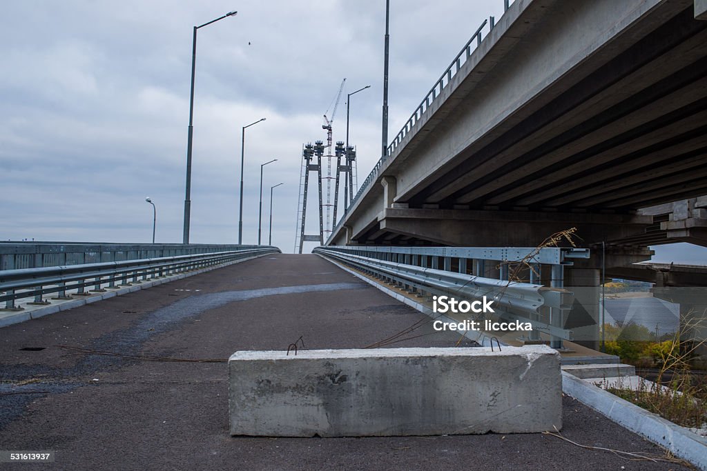 Construction of a new bridge Construction of the new arch bridge across the Dnieper River in Ukraine DIY Stock Photo