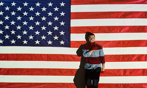 istock Smiling man in front of American flag 531614271