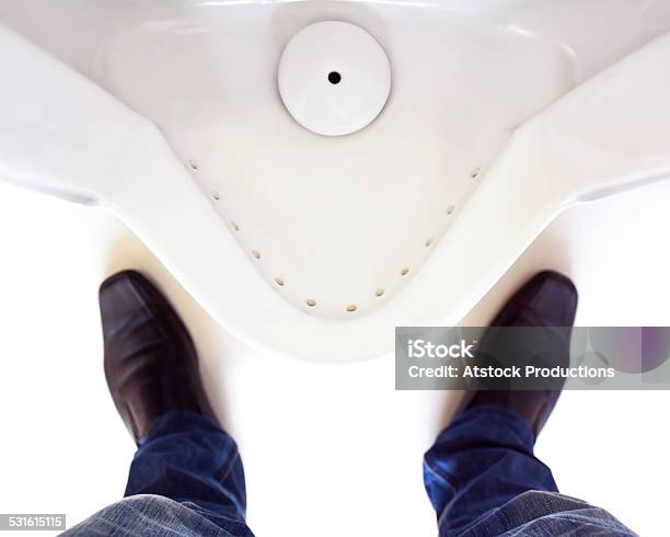 Man Legs In Front Of Urinal In Men Toilet Stock Photo - Download Image Now - 2015, Adult, Adults Only