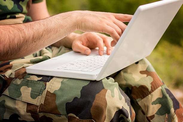 istock Solider on laptop, close-up 531616374