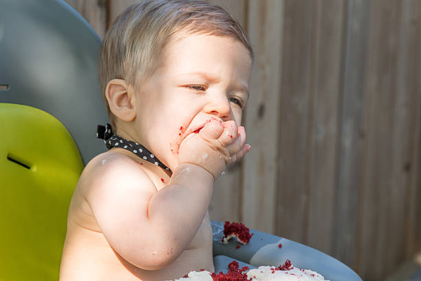 istock Baby Boy Eating Red Velvet Smash Cake 531616946