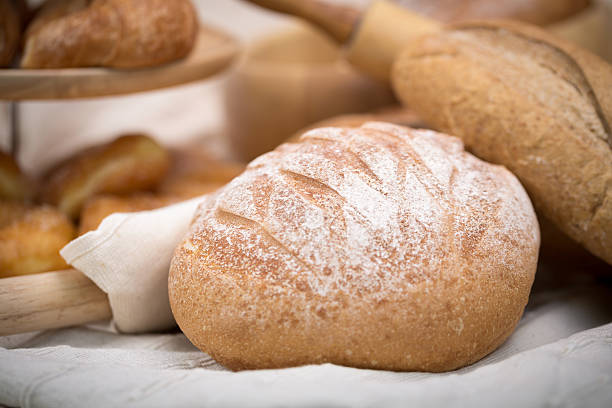istock Fresh homemade bread in a cotton cloth background 531616964