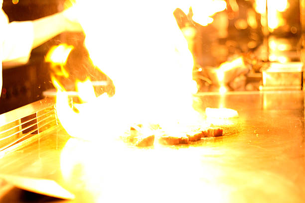 istock Chef grilling the steak on a pan, Teppanyaki 531617642