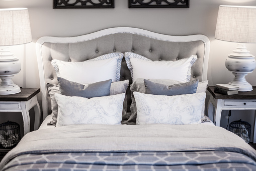 Luxury bedding with pillows in blue and white