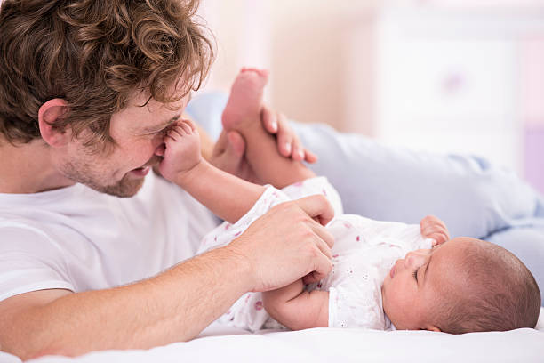 istock Father and baby playing together. 531620468