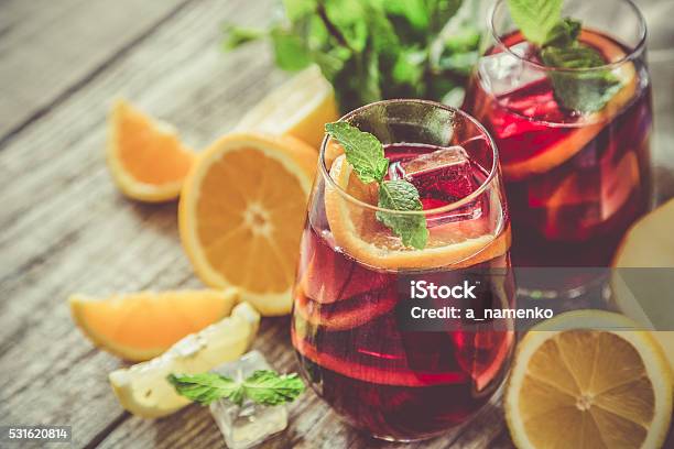 Sangria And Ingredients In Glasses Stock Photo - Download Image Now - Sangria, Homemade, Cocktail