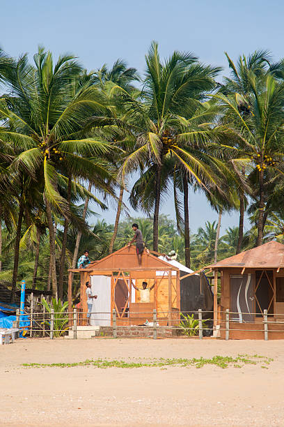 panoramic view on beach with boats in Goa at sunrise hour