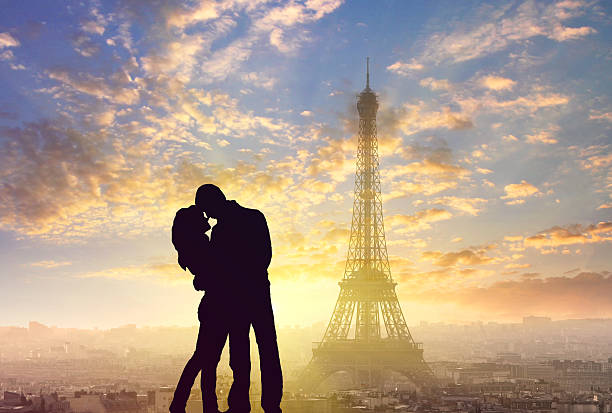 istock silhouette of romantic lovers with eiffel tower in Paris 531622470