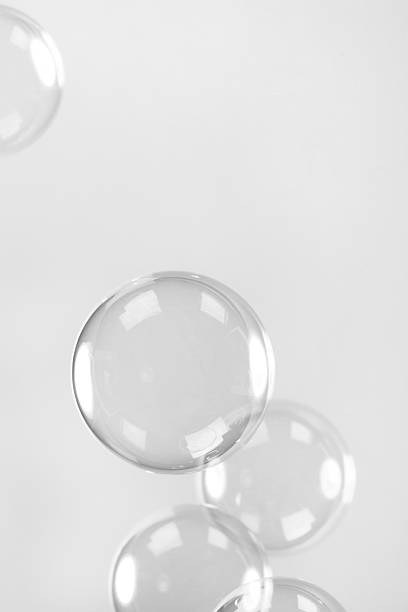 istock Transparent soap bubbles on a black background in black and white 531624580