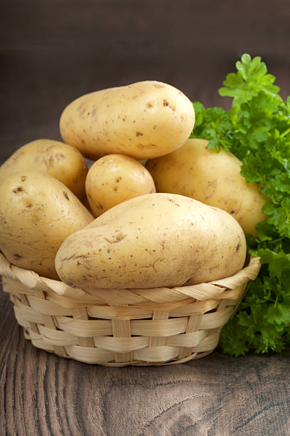 istock potatoes on a wooden background 531624854