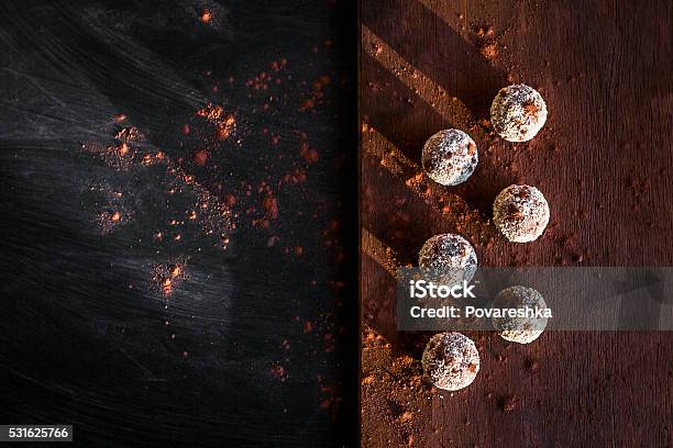 Small Chocolate Cakes On A Cutting Board Stock Photo - Download Image Now - Bakery, Brownie, Anniversary