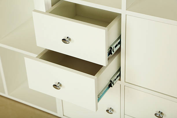 istock White wooden open boxes, white chest of drawers 531626822