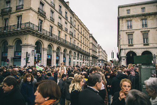 Bayonne, France - January 10, 2015: A large group of people gather in front of the city hall to protest against the terrorist attacks happened at Charlie Hebdo's headquarters and other locations at the french capital city.