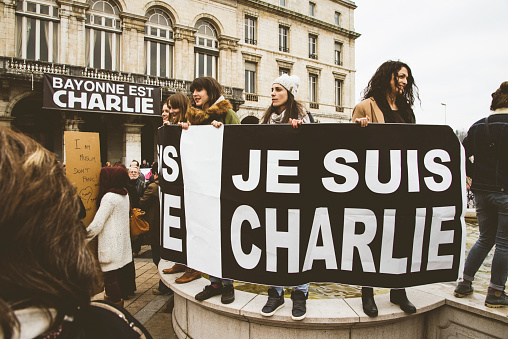 Bayonne, France - January 10, 2015: A large group of people gather in front of the city hall to protest against the terrorist attacks happened at Charlie Hebdo's headquarters and other locations at the french capital city. 