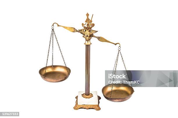 Imbalanced Scale Concept Stock Photo - Download Image Now - 2015, Balance, Brass