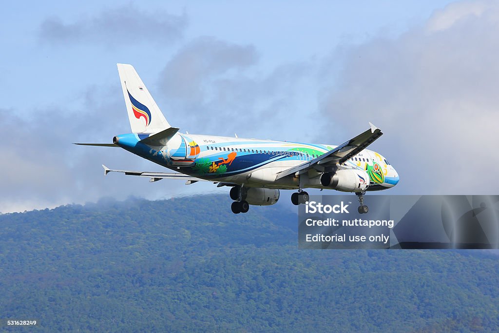 HS-PGV Airbus A320-200 of Bangkokairway airline Chiangmai, Thailand - July 25, 2014: HS-PGV Airbus A320-200 of Bangkokairway airline , landing to Chiangmai airport from Bangkok Suvarnabhumi. thailand. 2015 Stock Photo