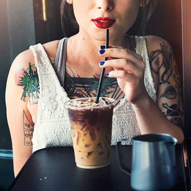 istock Hipster Woman Drinking Iced Coffee Concept 531628756