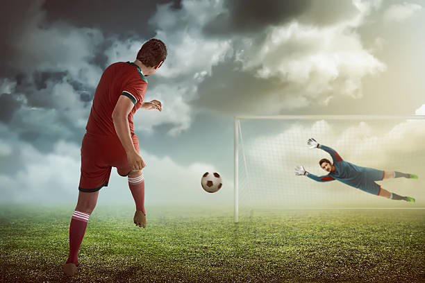 istock Man kick ball on the goalkeeper 531629458