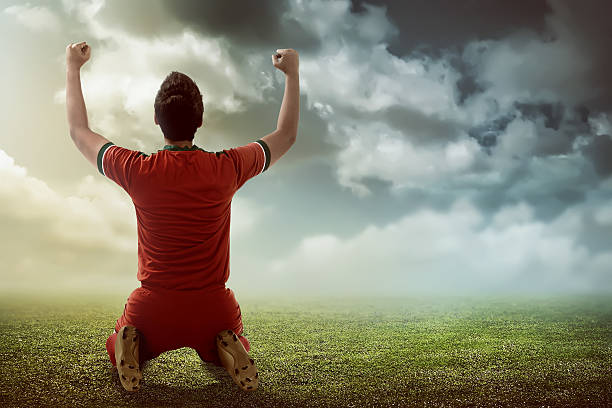 istock Winning football player 531629622