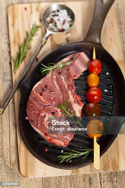 Raw Lamb Chops Stock Photo - Download Image Now - 2015, Affectionate, Cherry Tomato