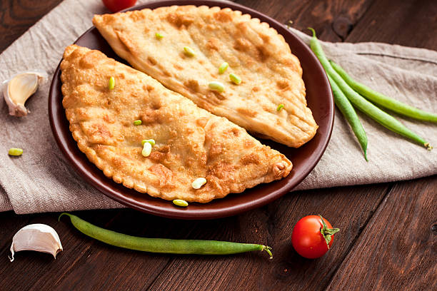 istock meat patties with cherry tomato and fresh bean pods 531629662