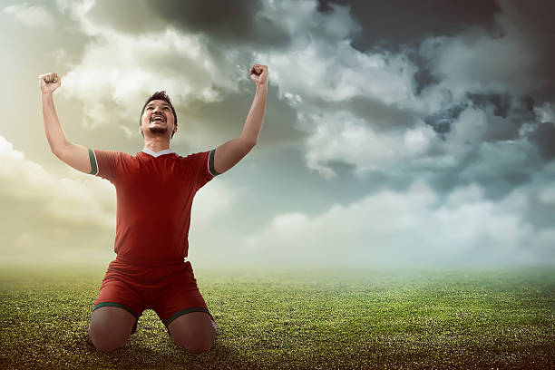 istock Winning football player 531629766
