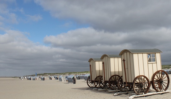 Historic bathing cars at the White Dune on Norderney