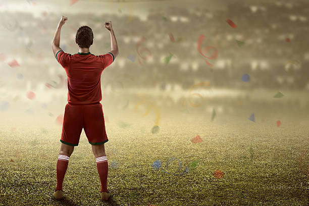 istock Winning football player 531630050