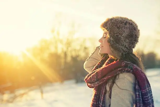 Woman enjoying a winter day on mountains