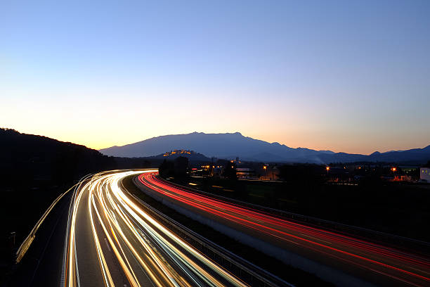 istock Rays of lights on highway at dusk. 531640443
