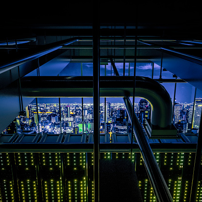 Data center in the City.the high view from cooling equipment and network servers racks with light,3D physically rending high quality.the City image of the background,shoot in Osaka Downtown,Japan with myself.