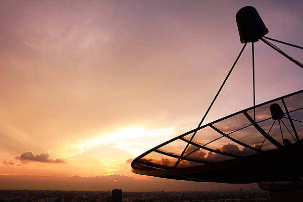 istock Satellite dish silhouette on twilight sky background 531642775