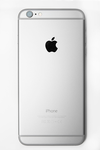 Canberra, Australia - October 24, 2014: Back view of a Apple iPhone 6 Plus on white background showing the phone's rear camera, flash and the Apple logo. iPhone 6 Plus (5.5 inches) is the next generation smartphone from Apple.