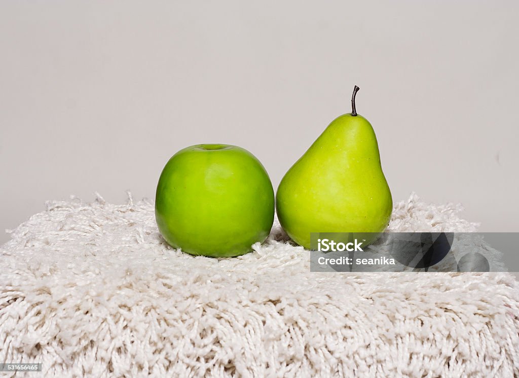 Apple and pear Apple and pear shot in studio 2015 Stock Photo