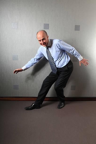istock businessman makes therapeutic exercises 531657203