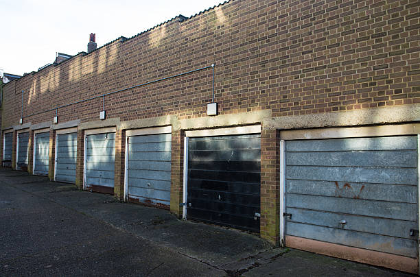 istock Car garages in a brick buliding 531658803