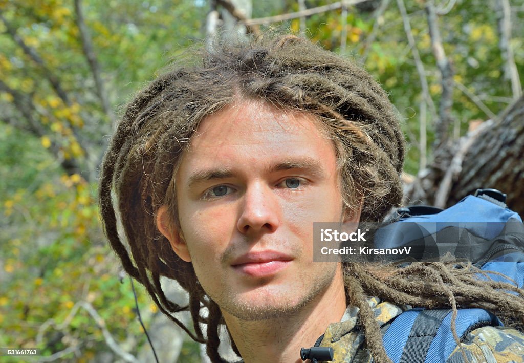 Young man A portrait of the young man with Afro hairdo in forest. 20-29 Years Stock Photo