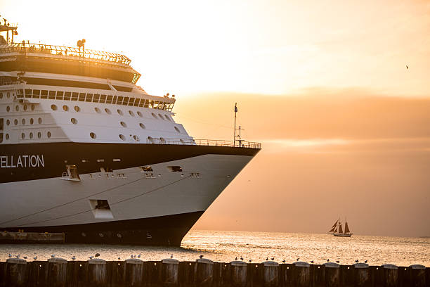 The huge cruise ship Aida prima in Hamburg harbour. This ship was built in 2016 and belongs to the latest ships in the cruise ship line. People on board are waiting for leaving the harbour to head towards the north sea.