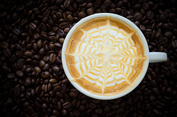 istock latte art on coffee bean backgroud 531672787