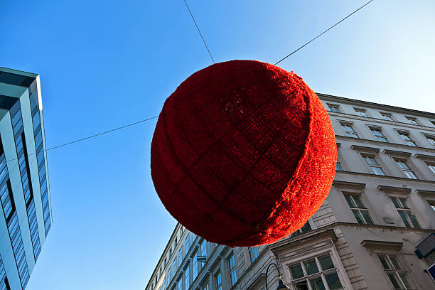 istock streets are decorated with red christmas bauble ornaments 531672927