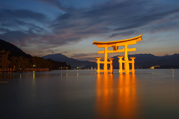 Hatsukaichi, Japan - September 5, 2014: Itsukushima Shinto shrine, the famous Torii gate on Miyajima in Japan. 