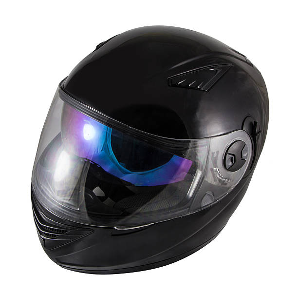 istock High quality Black motorcycle helmet over white background 531677127