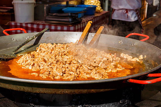 istock Cooking pieces of chicken at a fair in Budapest 531685192