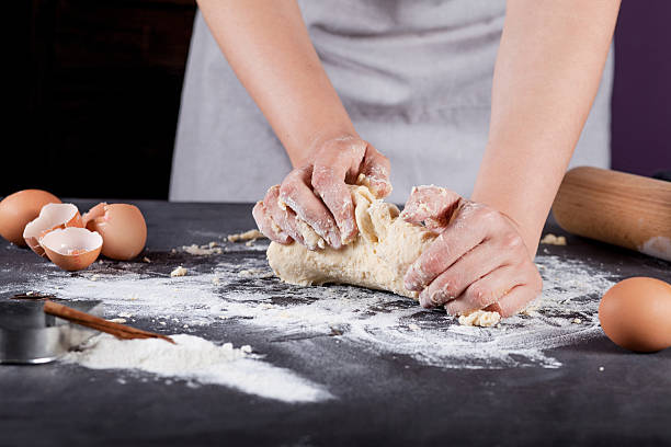 istock Baker is making  cookies with wooden rolling pin, flour, cinnamo 531685250
