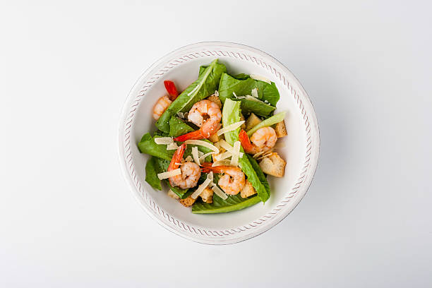 istock Caesar salad with shrimp, parmesan and croutons 531686090